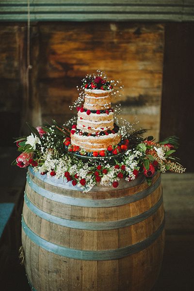 An old wine barrel brings a bit of bucolic beauty when serving as a cake pedestal. Rustic Cake Tables, Wine Barrel Wedding, Wedding Cake Display, Barrel Wedding, Country Wedding Cakes, Creative Wedding Cakes, Wedding Apps, Wedding Cake Table, Wedding Cake Rustic