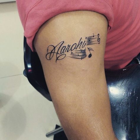 Clients Daughter Name with Musical Notes Done at Mehz Tattoo Studio. A Name Tattoo Design, Tattoo Ideas Daughters, Child Name Tattoo, Daughters Name Tattoo Ideas, Child Name Tattoo Ideas, Name Tattoos Designs, A Name Tattoo, Mew Tattoo, Name Tattoos For Men