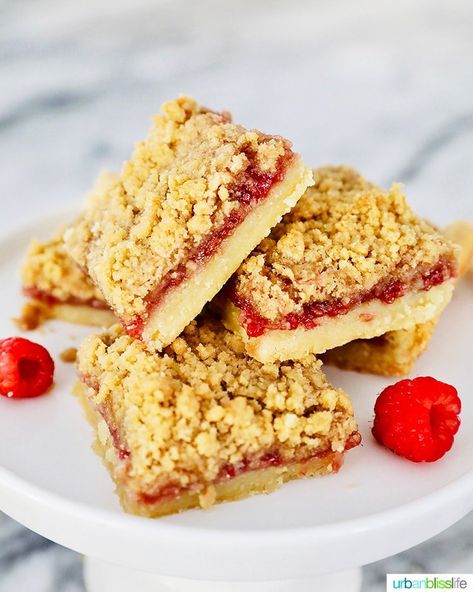 With sweet raspberry jam and a delectable shortbread crust, these Raspberry Crumble Bars are delicious, easily portable and giftable desserts! Raspberry Crumb Bars, Crunch Bars Recipe, Raspberry Crumble Bars, Lemon Cream Cheese Bars, Streusel Bars, Raspberry Oatmeal, Cheese Bars, Cream Cheese Bars, Crunch Recipe