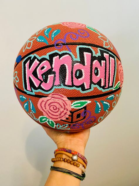 Hand Painted Basketballs. These make a great gift for that athlete in your life and can be customized however you would like. Be sure to visit my pinterest page and website to see all of the other custom products I create. https://www.pinterest.com/wbelaire/_created/ https://freshprintsofbelaire.com/ Painted Basketball Senior Night, Senior Gifts Basketball, Painted Basketball Ideas, Gift For Basketball Coach, Basketball Senior Night Gifts Baskets, Senior Night Ideas Basketball, Basketball Painting Ideas, Basketball Senior Night Ideas, Senior Basketball Gifts