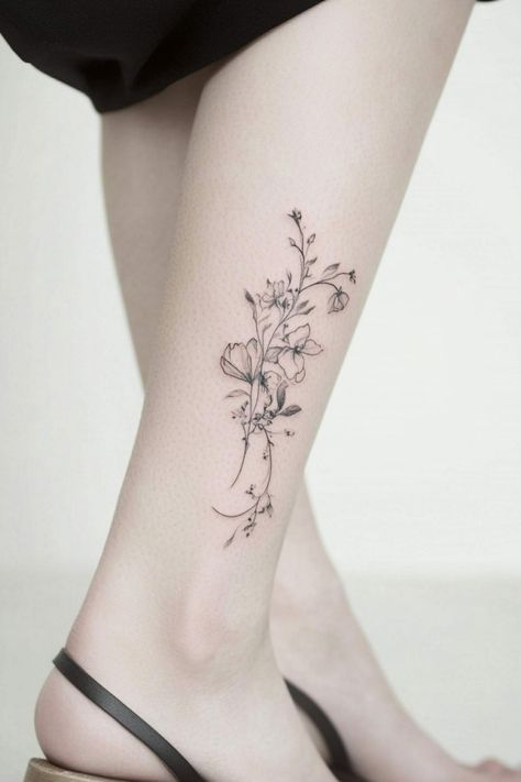 Delicate floral tattoo on the calf of a person's leg. Small Female Tattoos, Small Tattoo Designs For Women, Female Tattoo Ideas, Small Anchor Tattoos, Small Bee Tattoo, First Time Tattoos, Tiny Designs, Small Tattoo Ideas For Women, Small Cross Tattoo