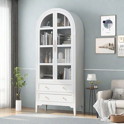 Features:Spefications:Dimensions:Assembly:Warranty: Color: White | GINATOL Simple Arched Glass Door Solid Wood Bookcase. 68.9 H x 29.5 W x 13.8 D in Wood in White | 13.8" L x 29.5" W x 68.9" H | Wayfair White Wood Bookcase, Dining Display, Solid Wood Bookcase, Bookcase White, Bookcase With Drawers, Office Bookcase, White Bookcase, Wood Bookcase, Room Closet