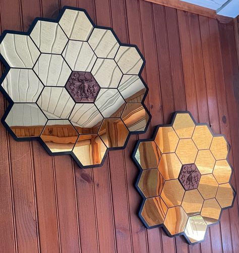 "🐝 Introducing the Breathtaking Honeycomb Wall Hanging Mirror 🐝 15% off for the holidays. was $140. now $120 Transform your living space into a buzzing haven of elegance and charm with our exquisite Honeycomb Wall Hanging Mirror. This stunning piece of art combines the timeless beauty of a mirror with the intricate details of nature, making it the perfect centerpiece for any room. Featuring a mesmerizing 3D carved Bee in flight at its center, our Honeycomb Wall Hanging Mirror captures the essence of nature's delicate balance. The Bee, meticulously crafted with precision, showcases its intricate wings and majestic presence, adding a touch of wonder to your surroundings. You have the freedom to choose the perfect complement for your decor, as the Bee is available in three luxurious wood op Bee Mirror, Bumble Bee Wall Art, Honeycomb Table, Neon Decorations, Honey Bee Home, Honeycomb Wall, Bumble Bee Art, Wall Hanging Mirror, Bee Wall