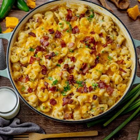 Jalapeno Popper Mac and Cheese is full of indulgent flavors from bacon, jalapenos, cream cheese and sharp cheddar, this macaroni and cheese recipe will instantly become a new fam favorite! Jalapeño Bacon Mac And Cheese, Jalapeno Popper Mac And Cheese, Bacon Jalapeno Mac And Cheese, Mac N Cheese Bacon, Jalapeno Mac And Cheese, Cheesy Pasta Recipes, Bacon Jalapeno Poppers, Smoked Mac And Cheese, Cheesy Macaroni