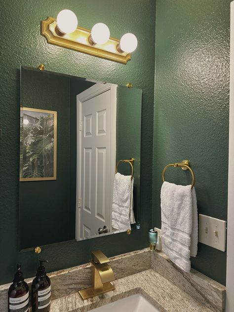 Dark green walls, with gold hardware Dark Green And Gold Decor, Green Black And Gold Bathroom, Black And Green Apartment Aesthetic, Green And Silver Bathroom, Dark Green And Gold Bathroom, Emerald Green And Gold Bathroom, Gold And Green Bathroom, Green And Gold Bathroom Ideas, Hunter Green Bathroom