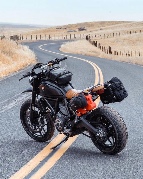 has his Ducati Scrambler set up for the road Whats your favorite setup? Have tips? Feel free to... Ducati Scrambler Custom, Estilo Cafe Racer, Adventure Bike Motorcycles, Xe Ducati, Motorcycle Backpacks, Moto Scrambler, Cb 300, Scrambler Custom, Мотоциклы Cafe Racers