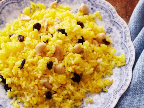 This rice is Indian inspired and so we call for traditional basmati, but Texmati rice will give much the same effect, and in fact any white rice is go... Rice With Cashews, Rice With Raisins, Raisins Recipe, Grains Recipes, Saffron Recipes, Raisin Recipes, Oven Vegetables, Saffron Threads, Saffron Rice