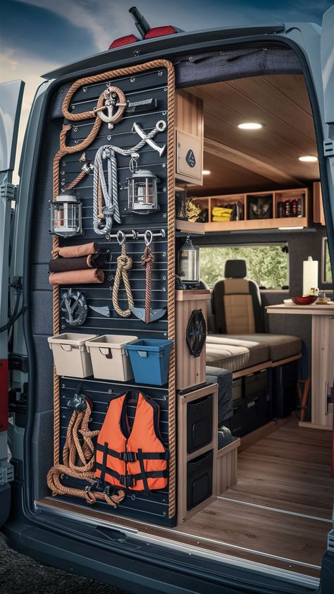 A nautical-themed gear wall with marine-inspired storage and table flips in an adventure van. Table Flips, Sprinter Interior, Van Organization, Gear Wall, Table Flip, Rv Motorhomes, Van Storage, Adventure Van, Storage Systems