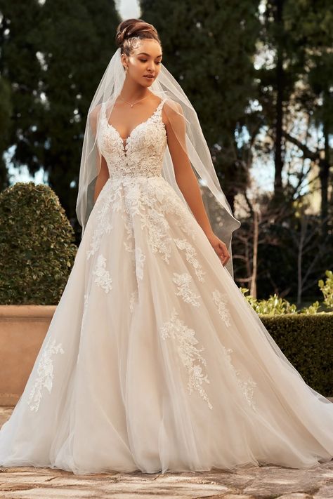 Floral Lace A-Line Wedding Gown Pierson. Description: Fall head-over-heels in-love with our majestic shimmering A-line gown, Pierson, with delicate floral lace details adding a subtle touch of romance. The V-neckline is decorated with floral-inspired lace appliqués that lead onto magical illusion straps and around to the back bodice, leading the eye to the simple fabric-covered button details that cover the zip-up back Sophia Tolli Wedding Dresses, Sophia Tolli, Evening Dresses For Weddings, Dress Order, Princess Wedding Dresses, A Line Gown, Wedding Dress Inspiration, Ball Gowns Wedding, Dream Wedding Dresses