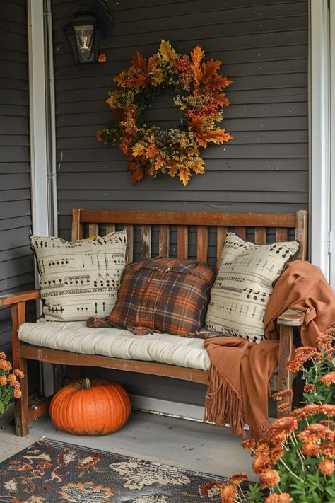 21 Cozy Fall Decor Ideas will inspire you to embrace the season and enjoy everything autumn offers. #modernfalldecor #cozyhome #homedecorideaslivingroom #modernfalldecor Fall Patio Decor, Fall Cabin, Porch Fall Decor, Fall Deck, Fall Patio, Outdoor Fall Decor Ideas, Fall Front Porch Decor Ideas, Artificial Floral Arrangements, Cozy Fall Decor