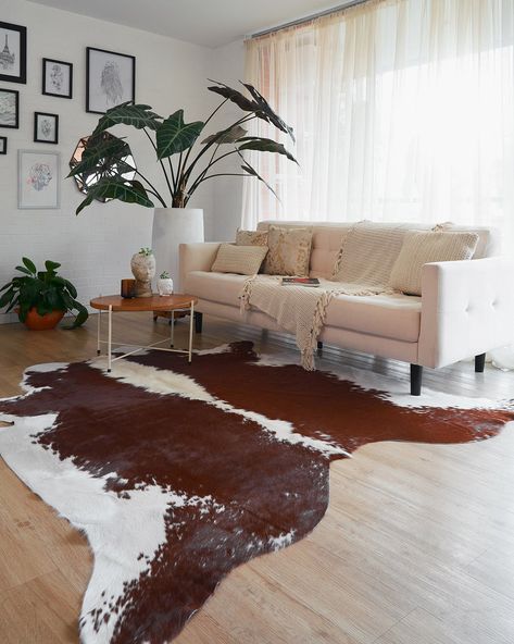 Discover the beauty and practicality of cowhide rugs. Perfect for adding rustic charm or modern elegance, these versatile rugs offer durability and a range of stylish options to suit any home décor. Faux Cowhide Rug Living Rooms, Hide Rug Living Room, Cowhide Rug Living Room, Black Cowhide Rug, Faux Cowhide Rug, White Cowhide Rug, Brindle Cowhide, Faux Cowhide, Cowhide Pillows