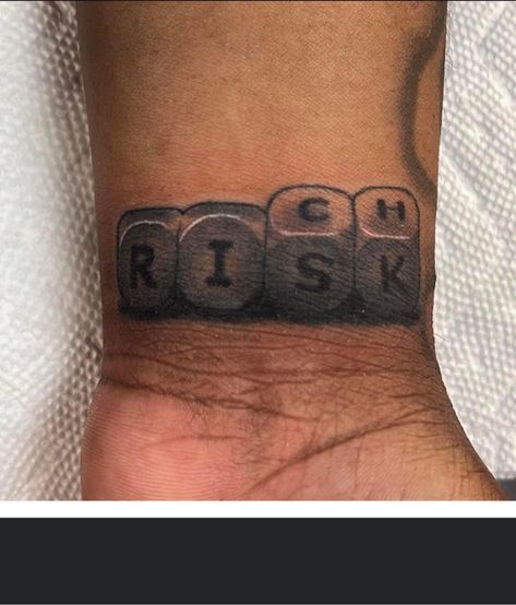 Risk Rich Tattoo For Men, Wrist Tattoo Men Ideas, Street Tatoos Men, Born Cursed Tattoo, Number 4 Tattoo Ideas, Trust None Tattoos Men, Tattoo Wrist Men, Risk Rich Tattoo, Risk Taker Tattoo