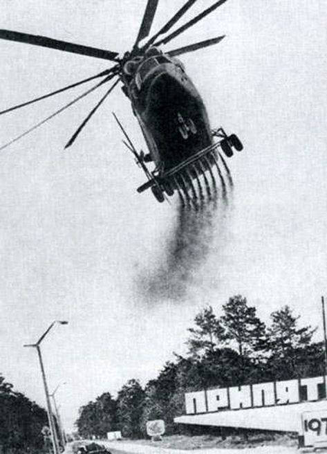 Chernobyl nuclear power plant disaster, soviet Mil Mi-26 “Halo” helicopters spraying coagulant agents, called burba, around the stricken plant and surrounding areas, in order to force radiation particles floating in the air to precipitate onto the ground, to prevent further expansion of the nuclear contamination, and to enable ground personnel to collect and bury the now contaminated soil. Cargo Helicopter, Chernobyl 1986, Nuclear Apocalypse, Chernobyl Nuclear Power Plant, Nuclear Power Station, Chernobyl Disaster, Nuclear Disasters, Nuclear Plant, Nuclear Power Plant