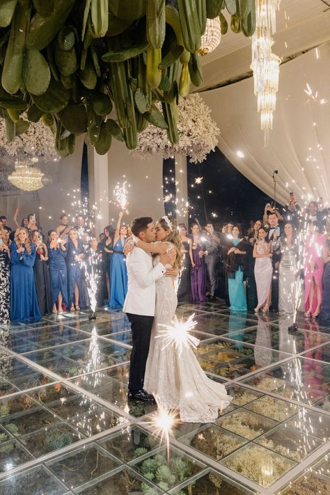 This dance floor might seem like an optical illusion, but look closer. This glass dance floor wowed wedding guests – and that wasn't the only design element that got people talking. Click to see some stunning décor. Custom Wedding Dance Floor, Glass Dance Floor, Wedding Dance Floor, Wedding Platform, Patio Floor, Dance Floor Wedding, San Lucas Mexico, Cabo San Lucas Mexico, People Talking