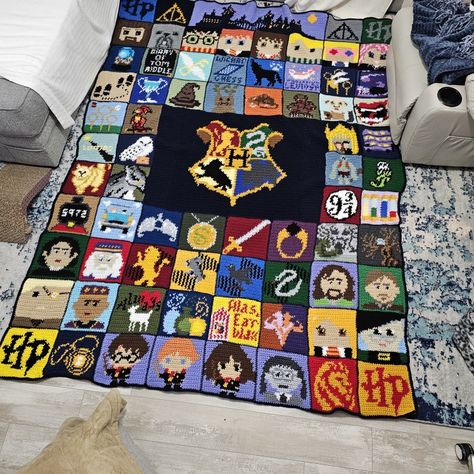 FINISHED HARRY POTTER AFGHAN (GRAPHGAN) BLANKET #1. 88 SQUARES. APPROX SIZE IS 96"×72" (8'H X 6'W). ALL PATTERNS WERE AQUIRED ONLINE FOR FREE. MODIFIED SOME AND MADE SOME MYSELF. Harry Potter Granny Square Blanket, Harry Potter Crochet Granny Square, Harry Potter Granny Square, Crochet Harry Potter Blanket, Harry Potter Crochet Blanket, Harry Potter Blanket, Harry Potter Crochet, Character Blankets, Crochet Idea