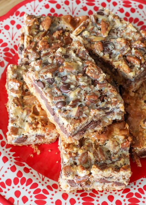 Hello Dolly Bars are chewy, sweet, nutty treats Dolly Bars, Hello Dolly Bars, Graham Cracker Toffee, Chocolate Butter Cake, Easy Custard, Mittens Knitting, Holly Dolly, Bars Chocolate, Cream Biscuits