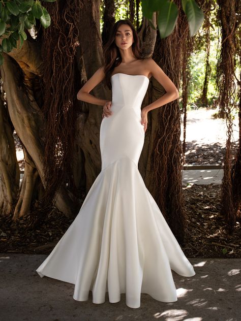 Come try this dress on at Bridal Extraordinaire - Strapless mermaid dress in mikado with form-flattering seams and floor-length buttons on back. Structured Mermaid Wedding Dress, Oberon Pronovias, Strapless Satin Mermaid Dress, Bridal Extraordinaire, Silk Mermaid Wedding Dress, Structured Wedding Dress, Wedding Dress Empire, Wedding Dress Mermaid Lace, Mikado Silk