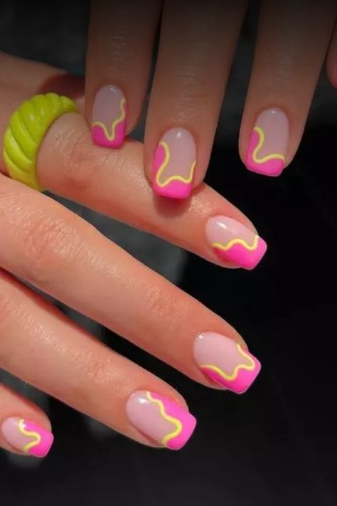 Get ready to make a statement with these vibrant neon nails for summer! Embrace the bold and bright colors that will perfectly complement your summer outfits and beach vibes. Stand out and express your fun personality with these eye-catching nail designs. Whether you prefer neon pink, green, orange, or yellow shades, there's a stunning option for everyone. Switch up your manicure game this season and let your nails do the talking. Bright Nails Designs Neon Art Ideas, Neon Cruise Nails, Neon Nail Inspo Acrylic, 80s Nails Designs Simple, Short Neon Nail Designs, Pink Lemonade Nail Designs, Pink Yellow And Orange Nails, Kid Summer Nails, Orange And Hot Pink Nails