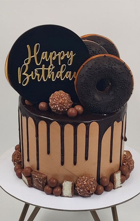 chocolate cake, chocolate birthday cake, birthday cake images, birthday cake ideas 2021 Chocolate Cake Happy Birthday, Chocolate Cake For Boy, Birthday Cake With Donuts On Top, Doughnut Cake Ideas, Cake Designs With Chocolate, Donuts Cake Birthday, Tart Cake Birthday, Chocolate Cake Decorating Ideas Birthday, Donut Cake Birthday