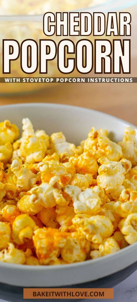 This cheddar popcorn is a quick and easy snack that is loaded with rich, cheesy flavor for the whole family! Simply prepare the popcorn (or use pre-popped popcorn), add some butter, and then toss it in powdered cheese! Enjoy it on your next movie night or just because! BakeItWithLove.com Flavoured Popcorn Recipes, Cheddar Popcorn Recipe, Popcorn Recipes Cheese, Popcorn Flavours, Cheesy Popcorn, Popcorn Recipes Easy, Stovetop Popcorn, Cheese Popcorn, Cheddar Popcorn