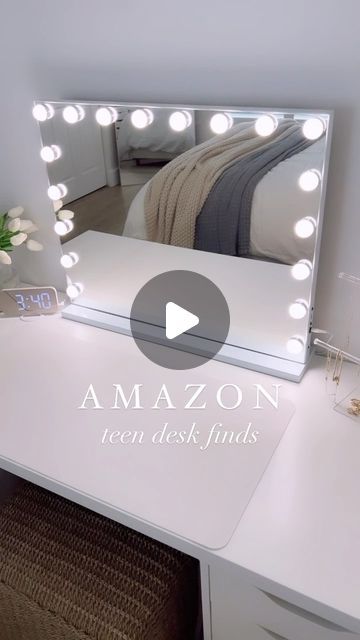 Cat Arcodia on Instagram: "Comment SHOP to get the link for these @amazonhome finds 🤍 My teen daughter is getting a bedroom refresh for back to school and these desk finds are the perfect addition🙌🏻

This large lighted vanity mirror has three light settings and a Bluetooth speaker🎶 The large desk mat is the perfect way to protect her desk while doing makeup or homework. Not only is the alarm clock aesthetically pleasing it doubles as a mirror. Lastly, we added this $5 acrylic jewelry stand which holds all her everyday jewelry perfectly. Follow for more bedroom updates✨

Need the link? Comment SHOP below or tap the 🔗 in my bio to directly shop my @amazon storefront or my @shop.ltk page🤍 🔗https://liketk.it/4gK4Y

#amazonhomefinds #amazonmusthaves #amazonfinds #teenbedroom #vanitymirro Desk Light Up Mirror, Teen Room With Makeup Vanity Desk Promoted By Amazon, Cheap Desk Mirror, Mirror Makeup Table Target, White Desk With Mirror And Lights, Teen Desk, Doing Makeup, Lighted Vanity, Lighted Vanity Mirror