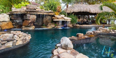 Spas | Lucas Lagoons Rock Waterfall Pool, Grotto Pool, Insane Pools, Tropical Pool Landscaping, Waterfall Pool, Dream Backyard Pool, Rock Waterfall, Cool Swimming Pools, Tropical Pool