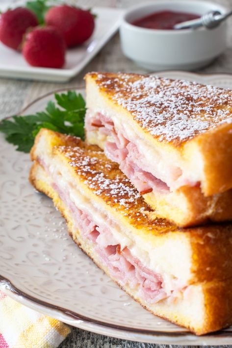 This Monte Cristo sandwich is an elevated grilled ham and gruyere sandwich cooked French toast style and served with delicious raspberry jam. Sweet and savory in every perfect bite!  This was my first time making Gruyere Sandwich, Ham And Gruyere, Monte Cristo Sandwich Recipe, Raspberry Freezer Jam, Ham Wraps, Monte Cristo Sandwich, Turkey Ham, Grilled Ham, Single Recipes