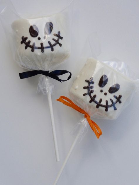 "Halloween, Halloween Decor, Chocolate, Skeleton, Nightmare Before, Christmas, Halloween Gift, Jack Skellington, Halloween Party, Chocolate Check out these Spooky Skull Chocolate Covered Giant Marshmallows. They would make the perfect treat at any Pirate or Halloween Party! Kids and adults alike will enjoy this delicious snack! Your chocolate Marshmallows will be \"made to order\" to ensure freshness. Each Jumbo Marshmallow is dipped in white chocolate and then decorated with chocolate accents. Chocolate Covered Marshmallows Halloween, Halloween Chocolate Covered Marshmallows, Halloween Marshmallows, Skull Chocolate, Marshmallow Halloween, Decorated Marshmallows, Giant Marshmallows, Halloween Fiesta, Halloween Snacks For Kids