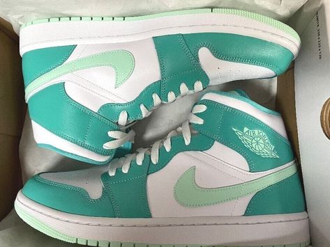 WMNS NIKE Air Jordan 1 Mid Washed Teal Mint Foam Shoes - WMNS Size 12 **CONFIRMED SHIPPED PRESALE** - Ships Immediately when received!! (Expected IN HAND by Wed. 7/27). Dressed in a Washed Teal, White, and Mint Foam color scheme. This offering of the Air Jordan 1 Mid comes constructed in a full leather build featuring a White base with Green overlays and a pastel shade of Green on the Swooshes, tongue tags, Wings, and rubber outsole. White nylon tongues, laces, and midsole completes the design. Teal Nike Air, Cute Air Jordans, Air Jordan 1 Custom, Teal Jordans, Shoes Nike Dunks, Jordan 1 Custom, Cute Jordans, Custom Air Jordan 1, Teal Nikes