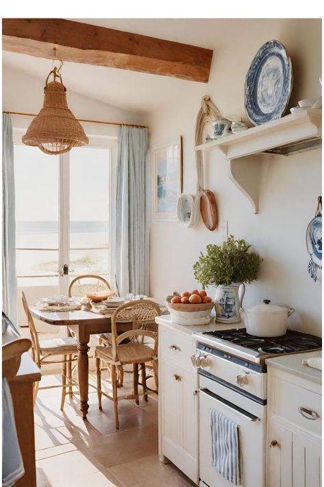 #costal #kitchenideas #blueandwhite #woodbeams #rattan #cottagekitchen Small Costal Kitchens, Cozy Beach Cottage Exterior, Coastal Apartment Kitchen, Boho Coastal Farmhouse, Tiny Coastal Cottage, Coastal Country Home, Beach Apartment Kitchen, Beach Coastal Interior Design, Costal Cottage House Interior