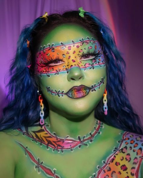 Lisa Frank-enstein (not the movie lol) 😂 🩷🧡💛💚🩵 Ib @twistinbangs lips @beatsbydeb @mehronmakeup clown white, paradise FX neon paint palette, red, white & black paradise paints @blendbunnycosmetics blends palette @glisten_cosmetics green + yellow spectra bases @hudabeauty @hudabeautyshop ex-wife liquid lip . . . #lisafrank #frankenstein #halloweenmakeupideas #halloweenmakeup #bodypaint #facepaint #makeupideas #makeuplook Cute Frankenstein Makeup, Lisa Frank Makeup Looks, Lisa Frank Makeup, Frankenstein Makeup, Lisa Frankenstein, Cute Clown Makeup, Glisten Cosmetics, Frankenstein Costume, Neon Paint