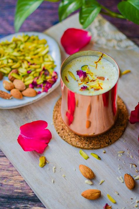 Kesar badam milk served with nuts in a brass glass indoors Badam Doodh, Kesar Badam Milk, Kashmiri Culture, Kashmiri Cuisine, Kashmiri Recipes, Badam Milk, Sabudana Recipes, Taco Bell Quesadilla, Kulfi Recipe