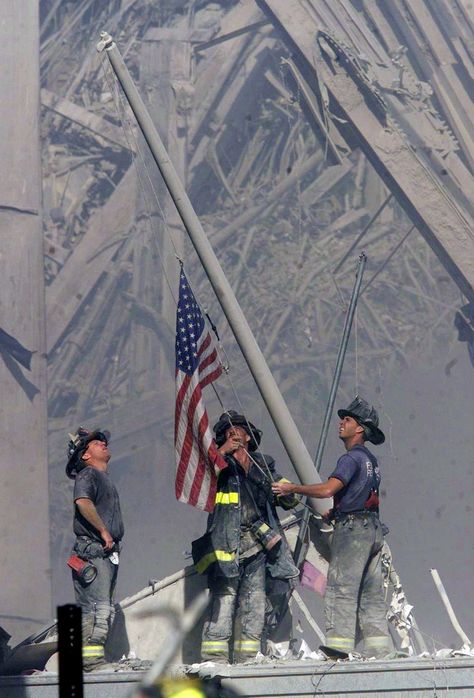 September 11, 2001 — Raising the Flag at Ground Zero | The 50 Most Powerful Pictures In American History James Nachtwey, World Trade Center Attack, Powerful Pictures, We Will Never Forget, The American Flag, Air Force One, Twin Towers, Lower Manhattan, Magnum Photos