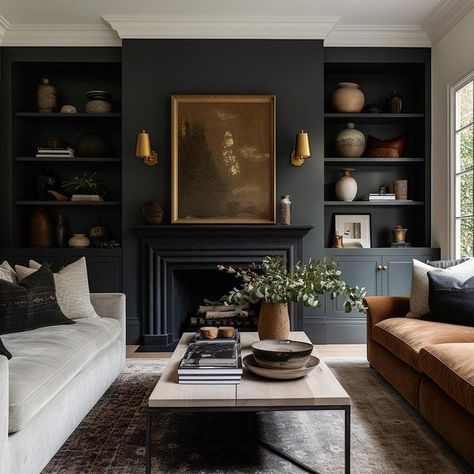 Wind The Key | Loving every bit of this gorgeous modern farmhouse living room! Design: @windthekey Click the link in our bio to visit our blog… | Instagram Dark And Cosy Living Room, Moody Den Colors, Brown Painted Fireplace, Blue And Brown Interior Design, Sitting Room Ideas With Fireplace, Artwork Above Fireplace, Small Moody Living Room, Black Built Ins Living Room, Moody Blue Living Room