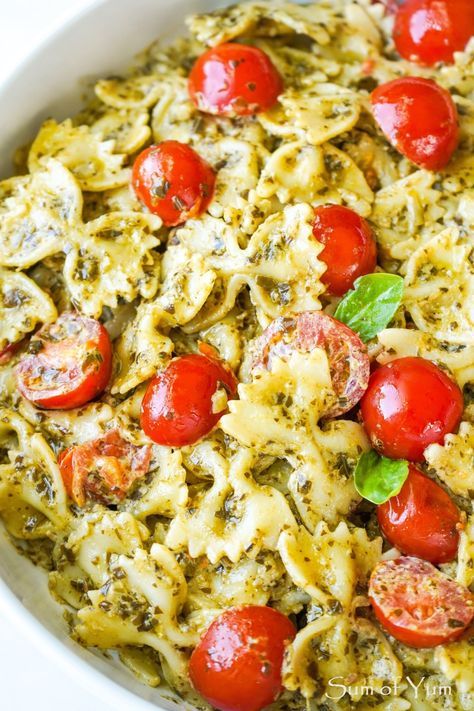 Creamy Pesto Pasta with cherry tomatoes and the best basil pesto sauce is super yummy! This easy pesto pasta recipe is ready in 15 minutes! | sumofyum.com Pesto Dried Tomato Pasta, Pasta Salad With Creamy Pesto Vinaigrette, Creamy Pesto Pasta With Sundried Tomatoes, Pest Pasta Recipes, Pioneer Woman Pesto Pasta, Pesto Bow Tie Pasta Recipes, What To Use Pesto Sauce On, Pesto Pasta Dishes Dinners, Creamy Pesto Pasta Salad Recipes