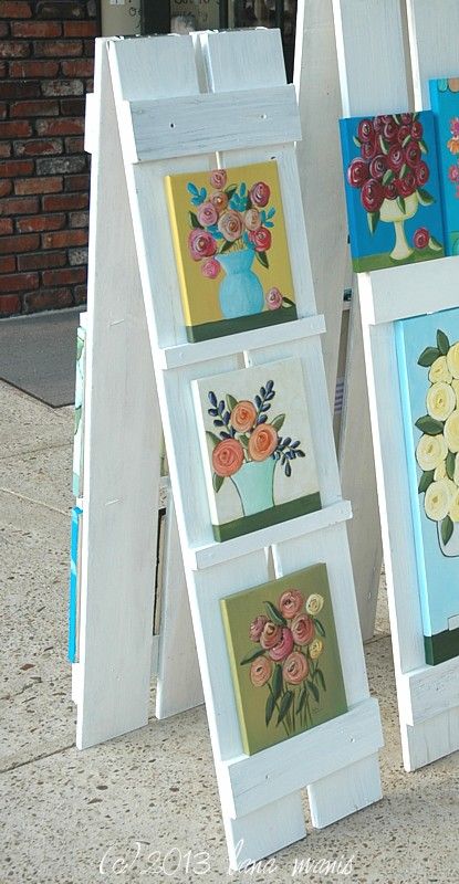 shutter easel lana manis Displaying Coasters For Sale, Creative Ways To Display Artwork, Vertical Display Ideas, Backyard Boutique Ideas, How To Display Vinyl Decals To Sell, Outdoor Display Exhibition, Diy To Sale, Car Charm Vendor Display, Diy Trade Show Display