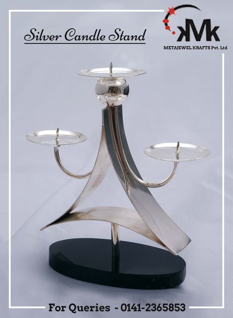 Beautify your contemporary home décor and add a tinge of classic traditionalism with this silver candle stand. Add elegance and style to your home, a dinner party, wedding and more when you choose this. #meta #jewel #silver #jali #tray #basket #jar #barni #table #watch #candle #stand #corporate #gift #pinkcity #jaipur #rajasthan Silver Candle Stand, Table Watch, Silver Articles, Tray Basket, Dinner Party Wedding, Silver Candle, Contemporary Home Decor, Candle Stand, Jaipur Rajasthan