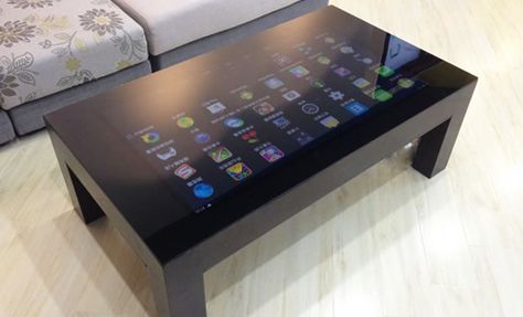 Very nice four leg coffee table with smooth glass top featuring a 42″ HD capacitive touchscreen.  This impressive table compliments most settings and is perfect for banking, hotel lounges, or home use. The surface is a thick waterproof tempered glass with 10 point capacitive touch technology. بيوت ملكية, Smart Table, Room Dressing, Camper Hacks, Hotel Lobbies, Diy Tech, Touch Table, Garden Posts, Pi Projects