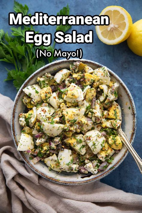 Enjoy this healthy egg salad with a Mediterranean twist that's ready in 20 minutes. This no mayo version gets its bright flavors from herbs, olives and zesty feta. This recipe is as easy as chop and mix! You can even cook the eggs a couple of days in advance and make the salad when you're ready. Egg Salad Salad, Mediterranean Egg Salad Recipe, Salads With Boiled Eggs, Greek Egg Salad, Egg Salad Recipe Without Mayo, Salads With Egg, Healthy Egg Salad With Greek Yogurt, What Goes With Egg Salad, Pesto Egg Salad