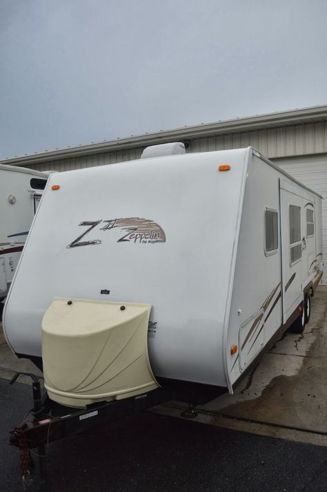 After 7 weeks of remodeling Drew and I have finally completed our 2006 Keystone Zepplin II travel trailer.  Drew did most of the heavy ... Rv Hacks Travel Trailers, Rv Remodeling, Best Rv Parks, Camper Hacks, Rv Trip, Diy Camper Remodel, Travel Trailer Remodel, Trailer Remodel, Rv Remodel