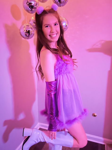 Girl standing in front of mirror balls/ disco balls wearing a purple Fembot costume with white knee length boots Fembot Costume, Some Ideas, Halloween Outfits, Halloween Costume, Halloween Costumes, Halloween, Purple