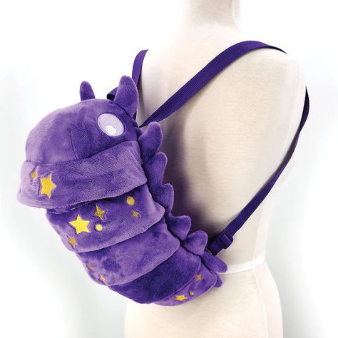 Magic Roly Poly Companion Plush Mini Backpack Uniquely designed deep purple plush backpack of our favorite small creature, the Roly Poly!Fabric lined interiorAdjustable backpack strap, measuring approximately 36 inchesZipper main closure Measures approximately 8in (Length) x 7in (Width) x 16in (Height) Isopod Backpack, Bug Backpack, Creepy Plushies, Stuffed Animal Backpack, Backpack Design Concept, Cute Mini Backpacks, Unique Backpacks, Plush Backpack, Roly Poly