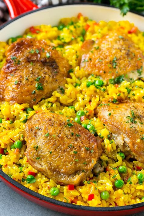 Arroz con Pollo Recipe | Chicken and Rice Recipe | Spanish Chicken #chicken #rice #onepot #dinner #dinneratthezoo #glutenfree Yellow Rice Recipes, Pollo Recipe, Spanish Chicken, Saffron Rice, Fried Chicken Breast, Chicken Thigh Recipes Crockpot, Boneless Chicken Thigh Recipes, Yellow Rice, Chicken Thigh Recipes Baked