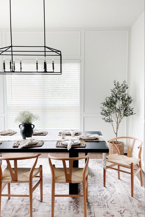 Neutral Dining Room with Black Dining Table and Wood Wishbone Dining Chairs. Washable Ruggable Rug. Sarrah Hazel Ruggable, Ruggable Living Rooms, Wishbone Chair Dining Room, Wishbone Chair Dining, Rug Under Table, Rug Under Dining Table, Poly And Bark, Black Dining Table, Dinning Room Rug