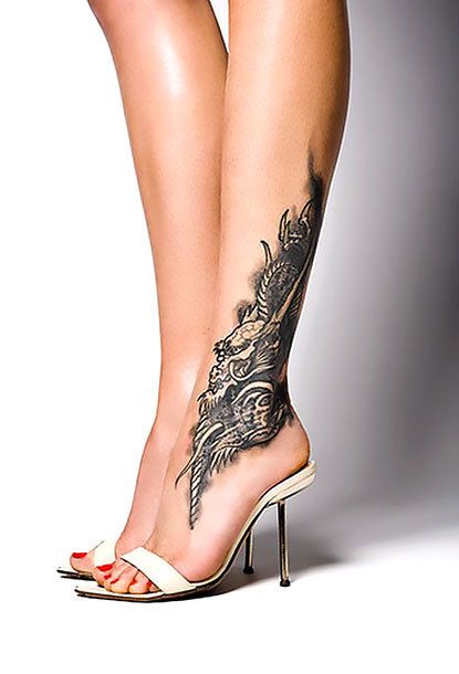 A tattoo with a gloomy mysterious beautiful dragon’s head. Tattoo Designs For Female, Leg Tattoo Designs, Inner Thigh Tattoos, Tattoo Calf, Best Leg Tattoos, Common Tattoos, Ankle Tattoo Designs, Ankle Tattoos For Women, Tattoo Leg