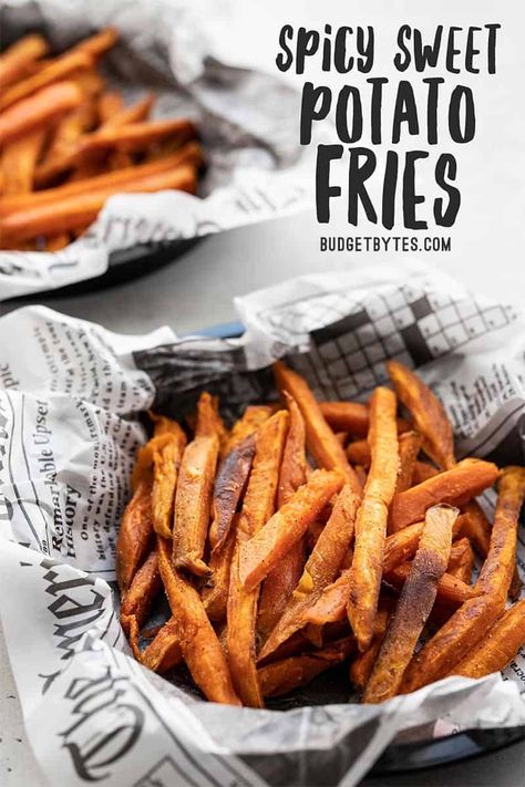 These Spicy Sweet Potato Fries are an easy side dish with a sassy sweet and salty flavor combination, plus a spicy Creole seasoning kick! Budgetbytes.com #sidedish #sweetpotatoes Spicy Sweet Potato Fries, Oven Fried Potatoes, Vegan Honey, Crispy Sweet Potato Fries, Crispy Sweet Potato, Budget Bytes, Spicy Seasoning, Budget Recipes, Sweet Potato Chips