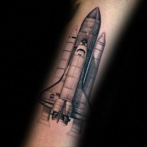 Detailed Realistic Forearm Spaceship Tattoo Ideas For Men #UltraCoolTattoos Space Shuttle Tattoo, Space Tattoo Sleeve, Spaceship Tattoo, Astronomy Tattoo, Houston Tattoos, Rocket Tattoo, Space Tattoos, Astronaut Tattoo