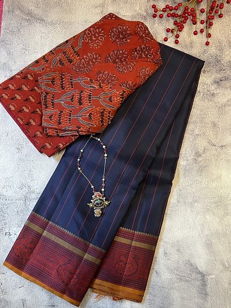 Kimaya navy red silk saree - A lighter kanchipuram silk saree in deep navy with red and mustard thread woven border and pallu. The saree is fully woven with thread and comes with a navy blouse piece. The blouse piece has small peacock motifs all over,woven in thread.  To view more lighter kanchi silk sarees, pls click on https://aavaranaa.com/product-tag/kimaya/ Kanchi Silk Sarees, Red Silk Saree, Saree Inspiration, Draping Styles, Saree Kanchipuram, Kanchi Sarees, Peacock Motifs, Desi Outfits, Saree Draping Styles