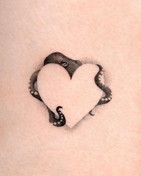 Octopus and negative space heart tattoo Turtle And Octopus Tattoo, Hand Octopus Tattoo, Octopus Tattoo On Hand, Peekaboo Tattoo Ideas, Small Octopus Tattoos For Women, Small Kraken Tattoo, Negative Space Heart Tattoo, Delicate Octopus Tattoo, Octopus Heart Tattoo