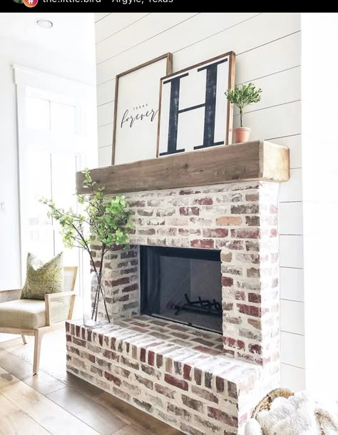 Indoor Brick Fireplace Ideas, White Living Room Brick Fireplace, Black And White Farmhouse Fireplace, Brick Accents Interior, Brick Fireplace Remodel Farmhouse, Shiplap Fireplace With Brick Hearth, Smeared Brick Fireplace, Brick Fireplace With Tile Floor, White Washed Brick Fireplace With Wood Mantle